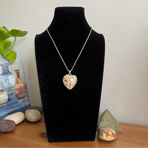 Jewelry - Puffy heart shape filigree silver tone necklace glow in dark - jewelry